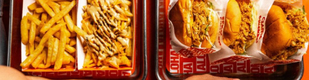 Food being served on tray at restaraunt