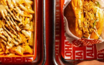 Food being served on tray at restaraunt