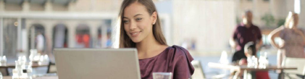 Woman at her business on laptop
