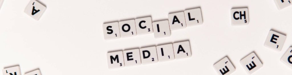 social media on scrabble pieces